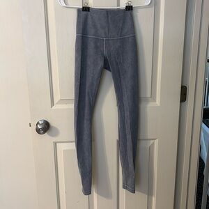 These are blue-grey lululemon leggings. Never been worn.